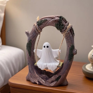 A Halloween white ghost ornaments swing ghost home decoration desktop ornaments festive atmosphere.