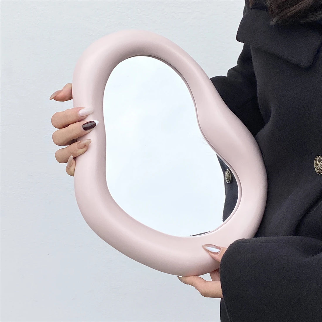 An irregular shaped ceramic makeup mirror simple design desktop decorative mirror bedroom living room dressing mirror decorative