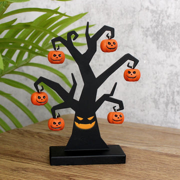 1 piece of pumpkin iron tree handicraft, full of evil pumpkin smiling face, iron tree covered with pumpkins, eerie atmosphere, H